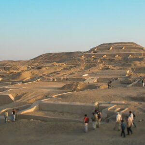 People exploring the Ancient Cahuachi ceremonial center of the Nazca civilization.