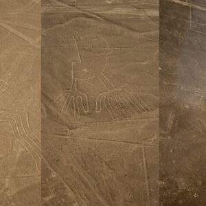 Aerial view of the desert landscape in Peru showing the geoglyphs of the Nazca Lines etched into the arid ground.